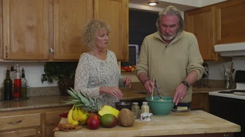 Retired Couple Making Pasta Stock Footage 35329330