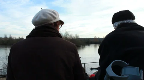 Retired couple relax with natural surroundings (model release, dolly shot) Stock Footage