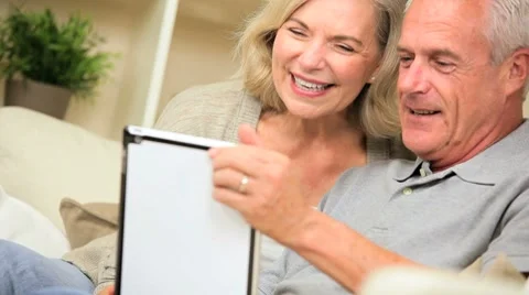 Retired Couple Using Online Webchat Stock Footage 8963267