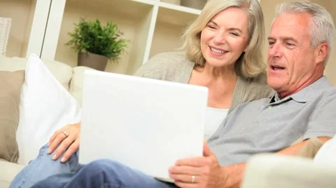 Retired Couple Using Online Webchat Communication Stock Footage 8963338