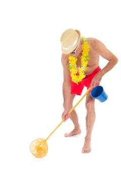 Retired man at the beach Stock Photos