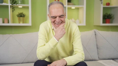 The retired old man, remembering the old days, gets emotional. Video stock 235620706