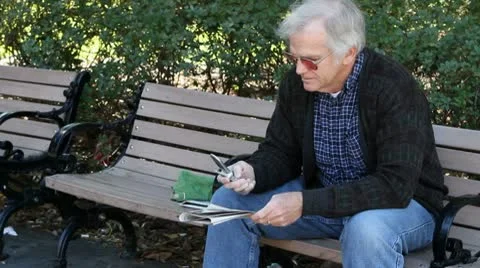 Retiree Calling About Ads Stock Footage 10571331