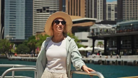 Retiree Soaking Up Warmth With Scenic View, Casual Summer Attire Enjoying Stock Footage 323794641