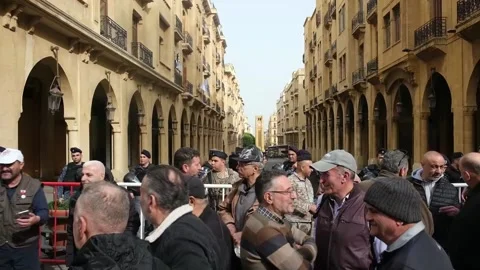 Retirees and teachers demonstrate in front of the Lebanese Parliament to demand  Stock-Footage 327736816