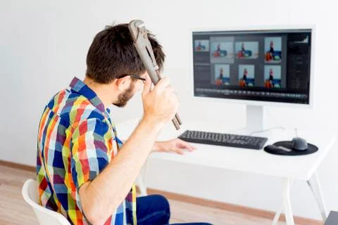 Retoucher is under stress Stock Photos