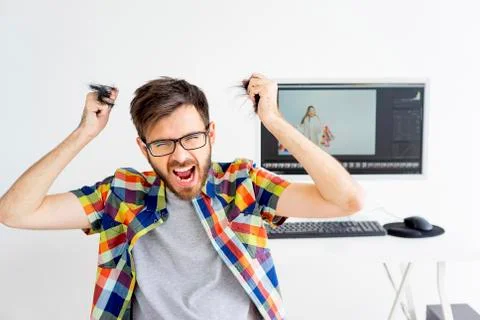 Retoucher is under stress Stock Photos