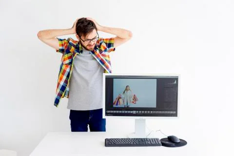 Retoucher is under stress Stock Photos