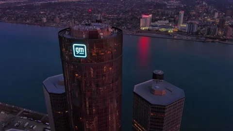 Retreating drone shot of Renaissance Building, downtown Detroit, dusk Stock Footage 287618814