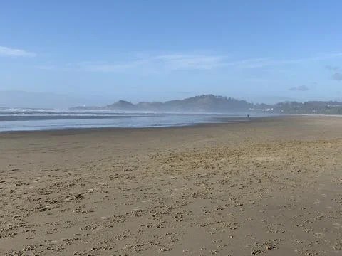Retreating waves view of beach 写真素材