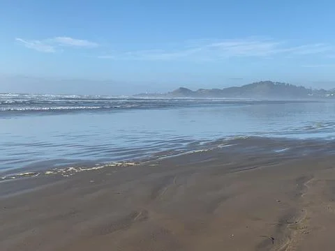 Retreating waves view of beach 写真素材