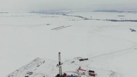 Retrieving drilling rig for oil and gas on land Stock Footage 124626038