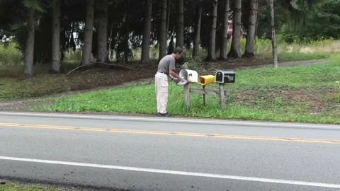 Retrieving the Mail Stock Footage 138774926