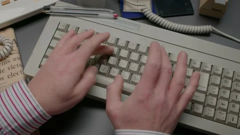 Retro 1980s Word Processor Keyboard With Male Hands Typing Stockbeeldmateriaal 233583770