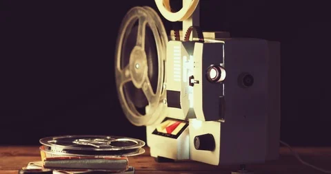 Old Film Reel Coiled on Retro Cinema Projector Large Spool, Stock Footage