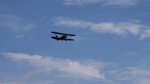 Retro airplane in cloudy sky Stock Footage 71288457