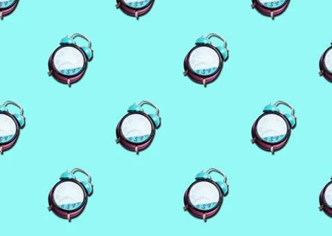 Retro alarm clock art pattern on pastel background Stock Photos