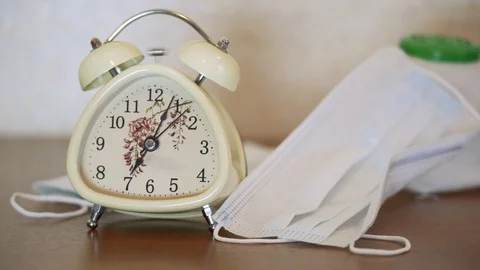 Retro alarm o-clock ringing. Quarantine by reason of coronavirus covid-19 threat Stock Footage 128554409