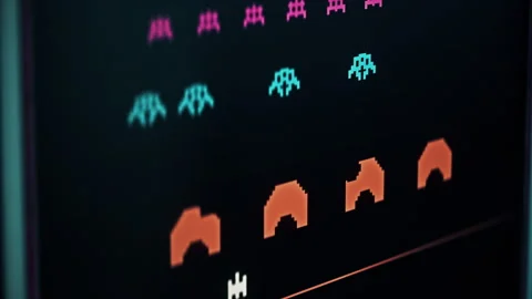 Retro Arcade Spaceship Defending From Alien Invasion In Old-School Fake Game Stock Footage 245012738