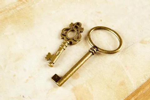 Retro background brass keys Stock Photos