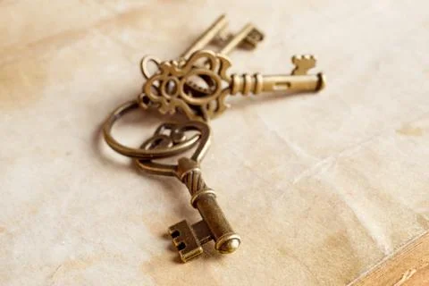 Retro background brass keys Stock Photos