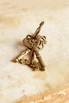 Retro background brass keys Stock Photos