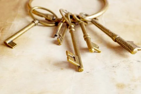 Retro background brass keys Stock Photos