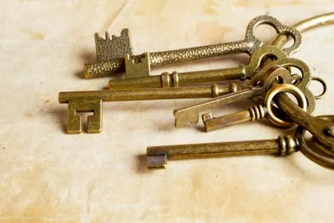 Retro background brass keys Stock Photos