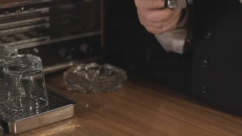 Retro bartender holding cigarette. FULL Hd Video stock 82650399