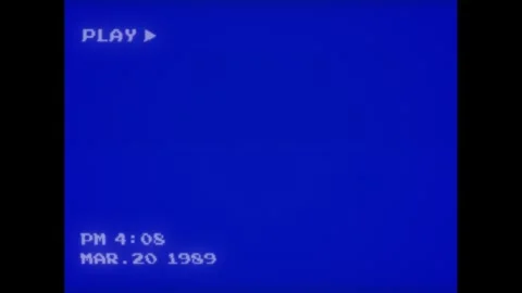 Retro Blue Screen VHS Playback with Glitch Effect, Analog VCR Timecode Stock Footage 315617239