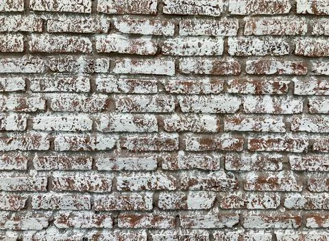 Retro brown brick wall which is painted with white painting color Stock Photos