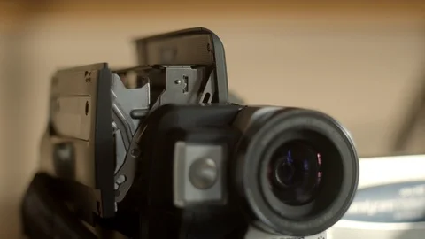 Retro camcorder inserting tape in slow motion, 4k Stock Footage 120261557