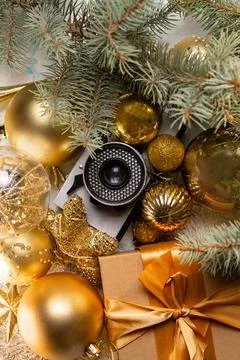 Retro camera background with christmas decor top view Stock Photos
