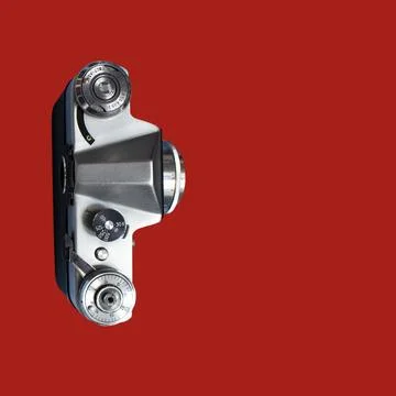 Retro Camera Header With Copy Space Over Red Background. Stock Photos