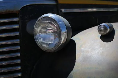 Retro car headlight. Close up Stock Photos