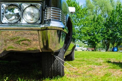 Retro car low angle view. View of the chrome bumper Stock Photos