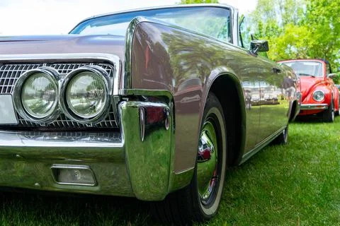 Retro car low angle view. View of the chrome bumper. Stock Photos