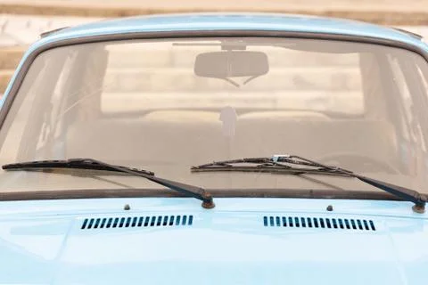 Retro car windshield with windshield wipers Stock Photos