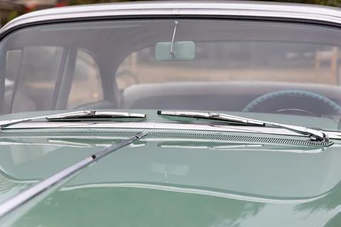 Retro car windshield with windshield wipers Stock Photos