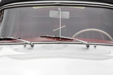 Retro car windshield with windshield wipers Stock Photos