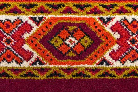 Retro carpet texture with hand-made decorative geometric pattern Stock Photos