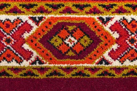 Retro carpet texture with hand-made decorative geometric pattern Retro car... Stock Photos