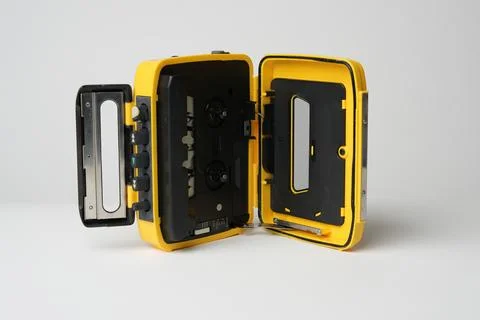 Retro cassette player with earbuds, 1990s Stock Photos