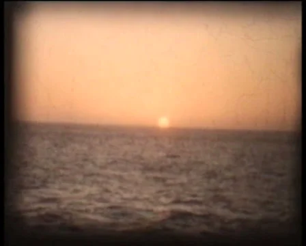 Retro Cine - Sunset over the ocean Stock Footage 2018982
