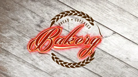 Retro classical loaf and cupcakes cookery with grain branches forming a circled Stock-Footage 129323922