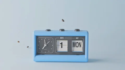 Retro clock with date and day of week and falling fragrant coffee beans. 스톡 동영상 129636135