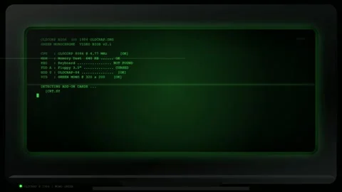 Retro Computer Boot Sequence with Green Monochrome Text on Old CRT Monitor Stock Footage 345752412