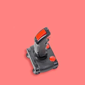 Retro computer gaming controller isolated on pink background. Stock Photos