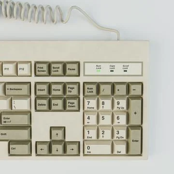 Retro computer keyboard isolated on white Stock Illustration
