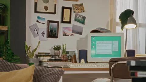 Retro Computer Setup on Desk Displaying Green Screen in Vintage Room Stock Footage 340272035